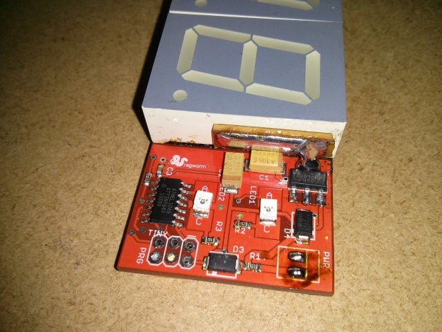 The control PCB, with LEDs, microcontroller, power supply and "heatsink".